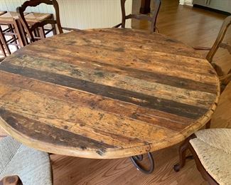 59. Rustic Plank Top Dining Table on Wrought Iron Base (62'' x 31'')
60. 5 French Provincial Ladderback Arm Chairs w/ Rush Seat (23'' x 21'' x 41'')