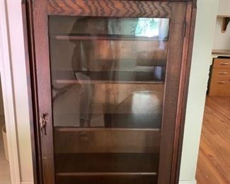 125. 1 Door Glass Front Antique Cabinet (30'' x 11'' x 56'')