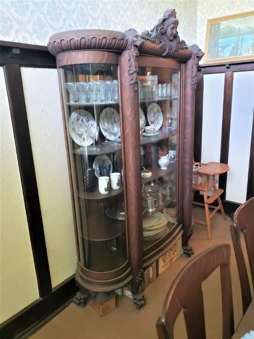 Heavily Carved Tiger Oak Curved Glass China Cabinet  58" Wide,  75" Tall,  22" Deep