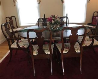 Double pedestal mahogany dining table with set of 8 Queen Anne style chairs -mint condition .