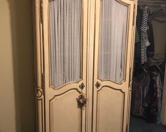 Vintage pale yellow armoire