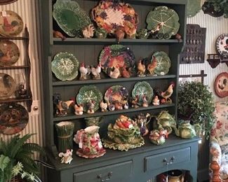 Beautiful Green Sideboard with a collection of majolica and roosters and hens 