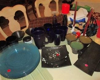 Chargers, black ceramic sushi trays, cups and goblets