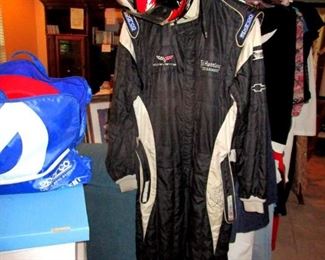 Race car driver fire retardant suit and helmet. Very collectible.