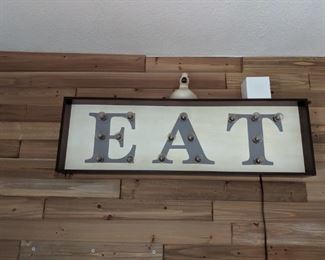 Lighted EAT sign