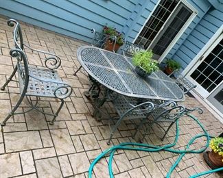 Cast Iron Oval Table w/ 6  Arm Chairs 