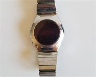 Vintage Timex H-cell watch (face is red)