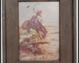Weathered wood framed Western Cowboy print by Charles Russell.