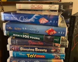 These are original Disney movies in their clamshell cases!