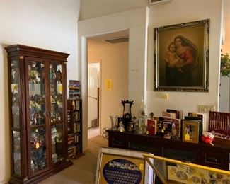 There's a nice compact TV stand with drawers and cabinets.  Lots of pretties inside the curios!