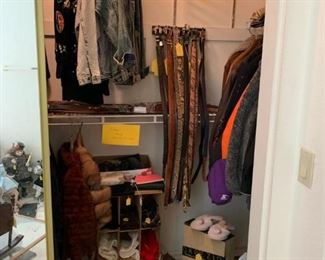 This is an AWESOME closet!  There are some nice belts, leather jackets, furs and clothing!