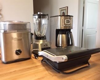 Small kitchen appliances:  Cuisinart ice cream maker, Oster blender