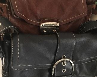 We have 2 Prada handbags and 4 Coach handbags!!! 👜 