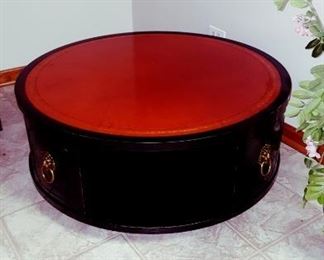 Red Topped Black Circular Drum Table
