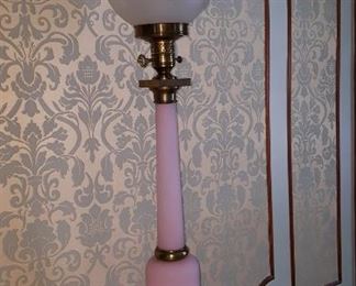 One of A Pair of Table Lamps with Pink Base a Circular Frosted Globes