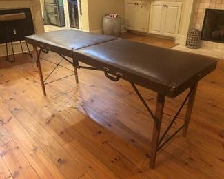 Very old fold up medical table