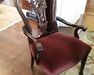 Formal armed dining chair