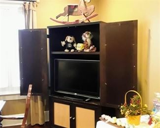 Entertainment center, flat screen tv, antique rocking horse