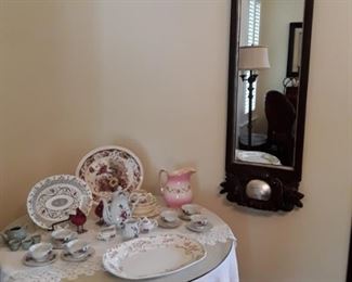 Tea sets, mirror, table