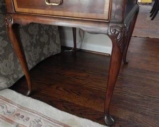 One of two formal Queen Anne end tables in living room.