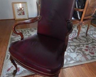 Leather and nail head arm chair for home office.