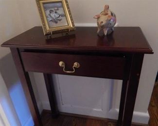Hallway accent table with drawer.