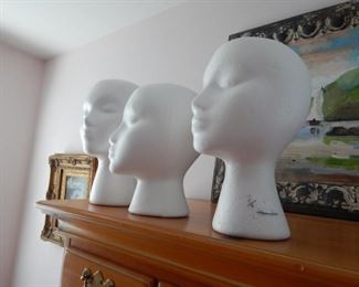 Wig and or hat stands.