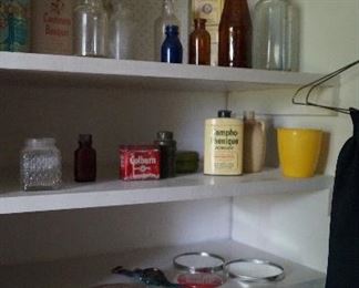 vintage medicine bottles and tins