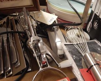 Many kitchen items as well as brand new re-giftable items too!