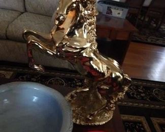 Large brass finish horse.