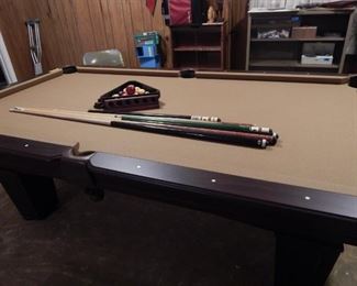 Nice clean pool table! Comes with the players sticks!