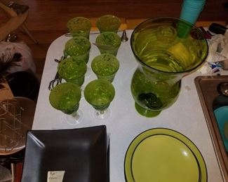 Green plates. Large vase. Not pictured are silver and gold trimmed martini glasses and vases. Some are crystal.