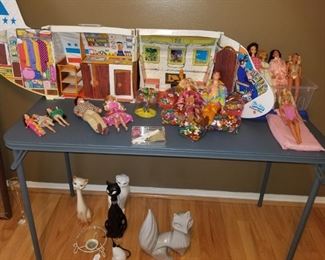 Some Barbies left, one vintage cats, fox.