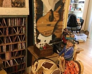 Delbert Buck, Navajo Dine Folk Artist created this wonderful horse with woman rider in New Mexico. It's about 4 ft wide by 3 ft high!