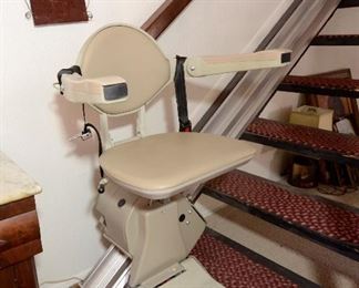 Chair Lift - Less than a year old. Works beautifully. Seat lifts up and arms to save space and swivels.
