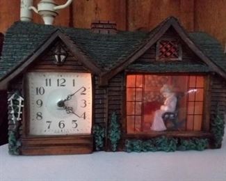 Front of vintage Ho.e Sweet Home lighted clock