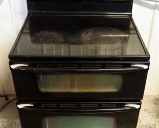 Electric Maytag Gemini Flat Top Stove with 5 Burners and Double Oven Model MER6775BAB, 46.5" x 30" x 28" Powers On