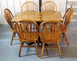 Wood Pedestal Dining Table 30"H x 48"W x 29"D with 6 Arched Slat Back Dining Chairs 37"H