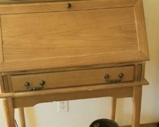 Small  Oak desk with writing surface and filing cubby holes