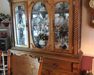 Oak table with 6 chairs and matching china hutch