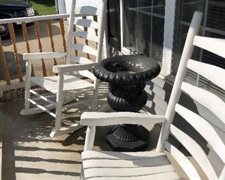 porch rocking chairs and concrete urn