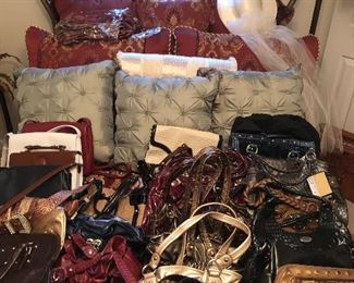 LOTS of purses many still have the tags