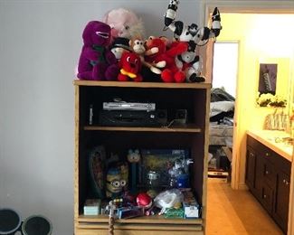 Stuffed animals - Guitar Hero - Wii Games - Minions - Barney - Clifford - Elmo!  The classics! Plus stitch, frosty, Pluto, Mickey in magicians cape 