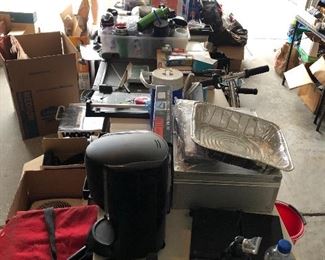 The wild and massive 3 car garage filled with tools, camping, computers, sports 