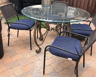 Iron base table - Woven chairs, BBQ