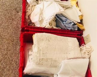 Overflow of linens - there are a ton of blankets, afghans, sheets, towels, table cloths, place mats, etc.  