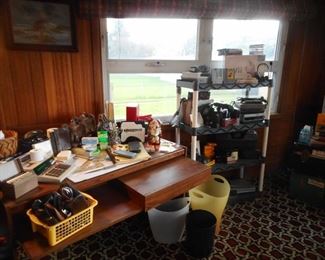 Computer Desk Filled with Office Supplies 