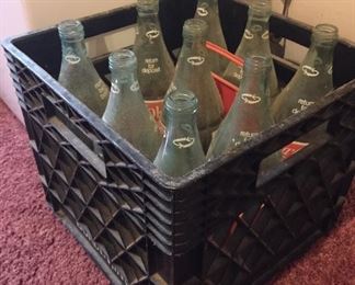 Coca Cola bottles and carrier