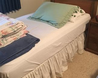 Twin bed: mattress (like new/clean), box spring, pillows and bedding all included. Two matching beds available.