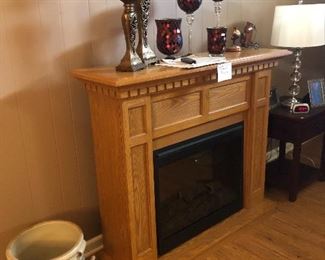 House 1: Antique crock and portable fireplace with remote